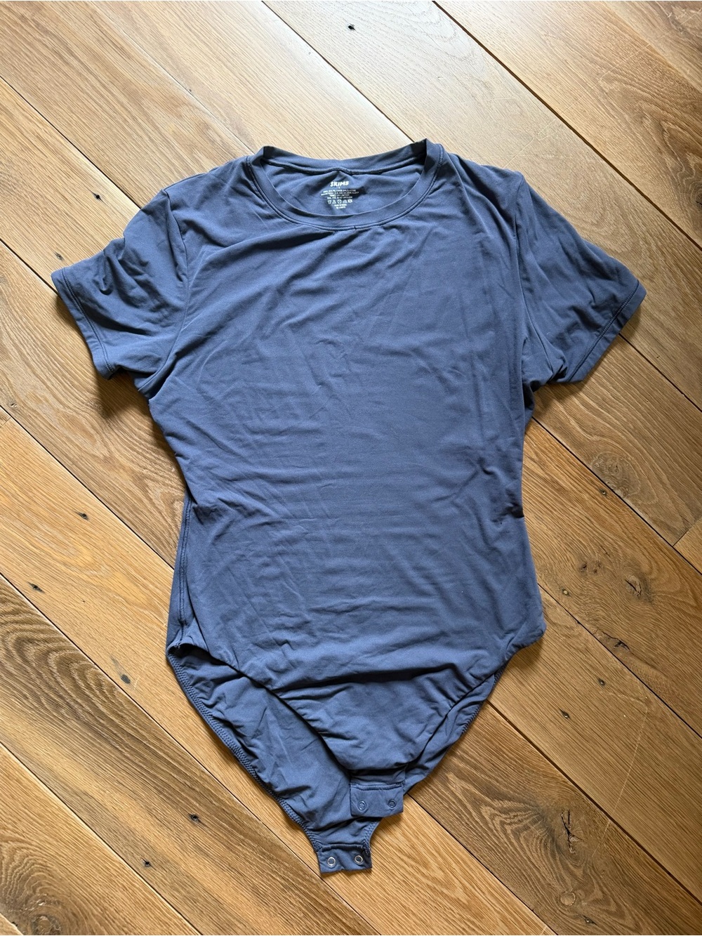 SKIMS bodysuit in steel blue